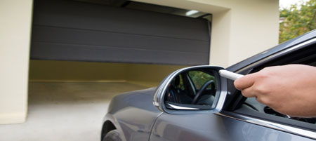 Garage door technician replacing torsion spring in Tarrytown NY